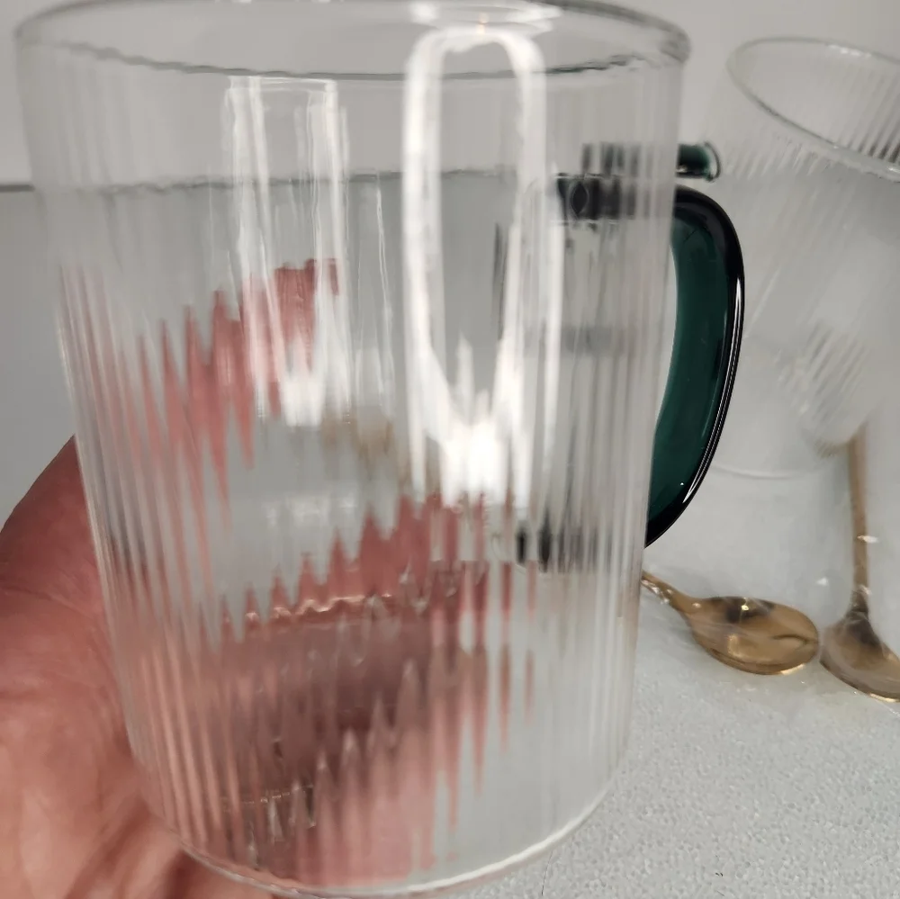 Lot 2 heat resistant clear and green‎ glass coffee/tea cups w gold stir spoons